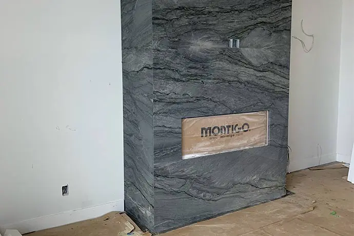 Granite fireplace installation