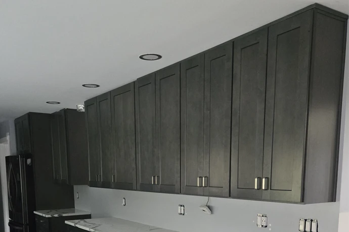 A line of new grey cabinets freshly installed