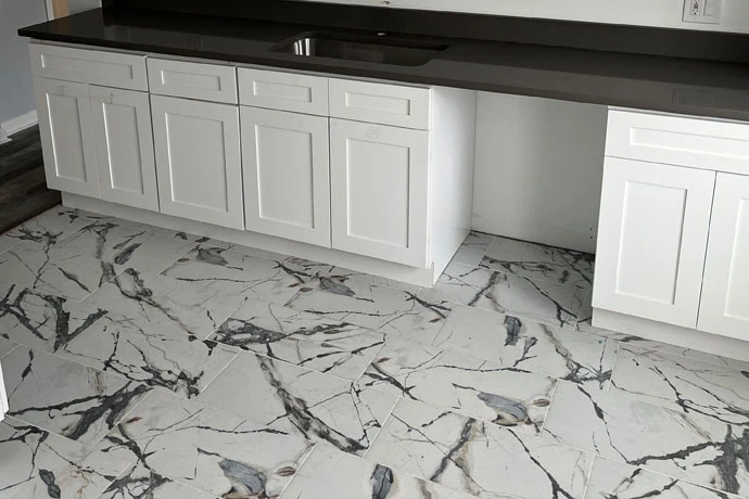 A freshly installed tile floor with marbled pattern