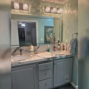 Newly installed bathroom countertop by Elite Granite & Marble